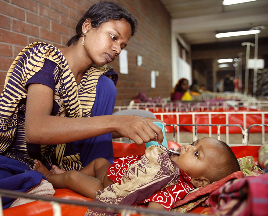 Mother administering ORS to child. Photo source: Bill & Melinda Gates Foundation/Prashant Panjiar